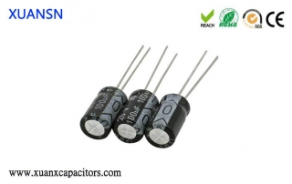 Electrode capacitor and electrodeless capacitor
